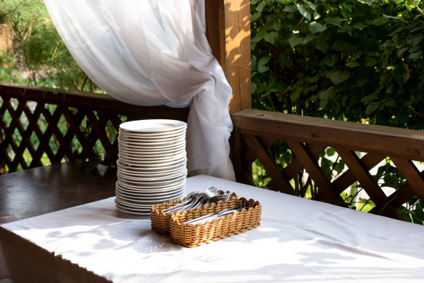istock plates and Cutlery on the veranda 1245028926