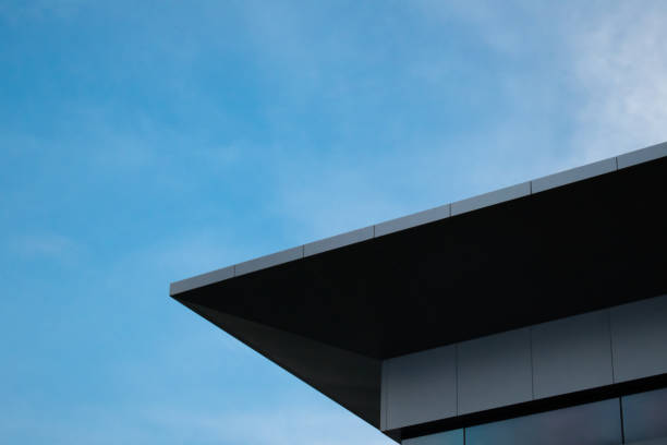 istock modern office building with blue sky abstract background 1245041689