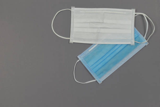 istock Medical mask on grey background. 1245041786