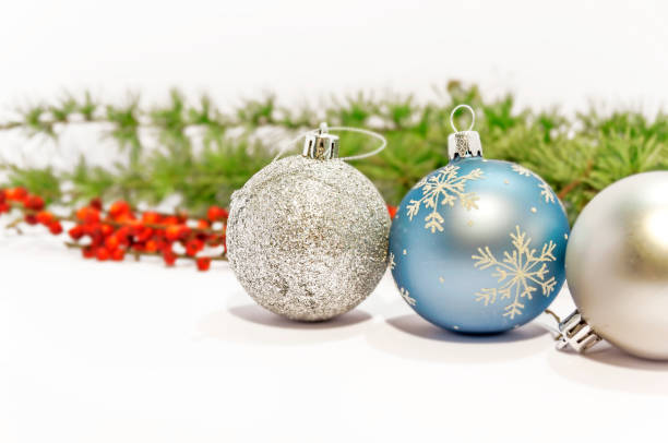 istock Close up blue and shiny gray decorative ball on the white background 1245042167