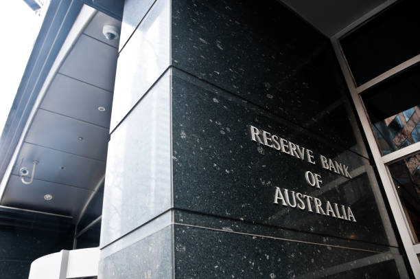 Black granite wall of Reserve Bank of Australia in Melbourne Australia Melbourne, Australia - July 26, 2018: Reserve Bank of Australia name on black granite wall in Melbourne Australia with a reflection of high-rise buildings. The RBA building is located at 60 Collins St, Melbourne VIC 3000 Australia. central bank photos stock pictures, royalty-free photos & images