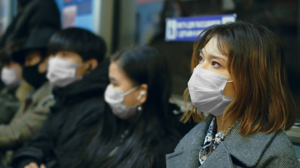 Coronavirus Pandemic Epidemic China. Chinese Flu People Subway. Public Transport Masked Asian People Real. Protect Ill Flu Coronavirus. Asia Health Care. Environment China Air Pollution . Illness Protection Corona Virus Chinese Infect . Allergy Guy Respiratory Face Mask. 2019-ncov london girl stock pictures, royalty-free photos & images