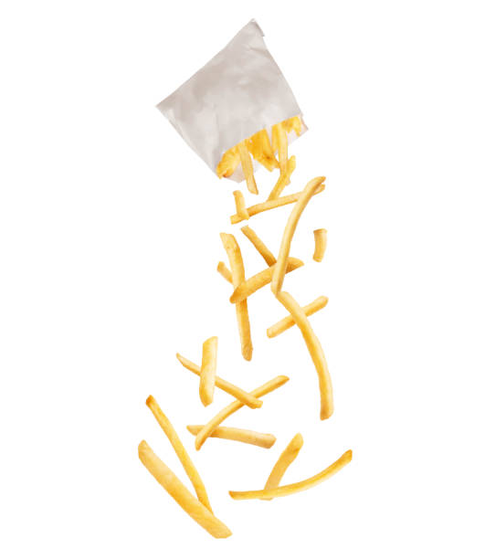 istock French fries fly out from paper packaging, isolated on a white background 1245054376