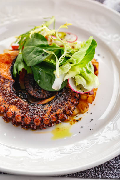 Close up of cooked octopus in a restaurant serving
