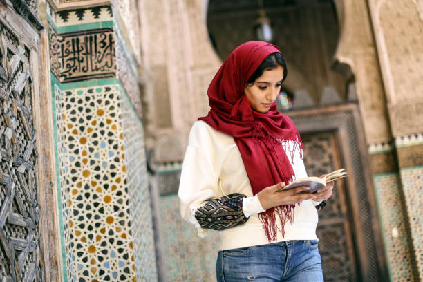 istock Arab woman reading a book 1245067805
