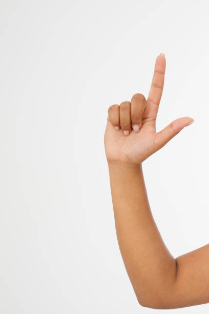 istock finger point isolated white background. afro american hand. Mock up. Copy space. Template. Blank. 1245069966