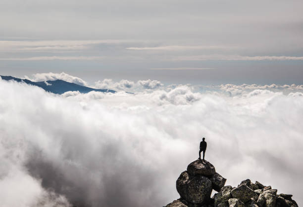 istock A man above the fog 1245085258