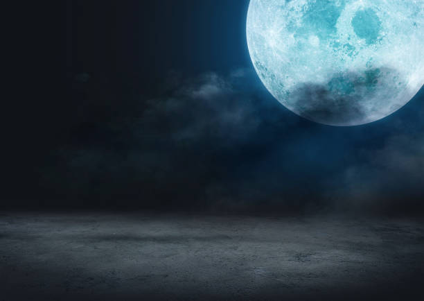istock halloween background concept, backgrounds night sky with full moon and clouds. Elements of this image furnished by NASA 1245086399
