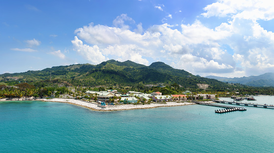 Panorama of tropical island with port and resort