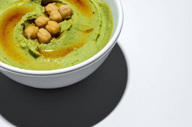 istock Homemade avocado and chickpea hummus 1245087536