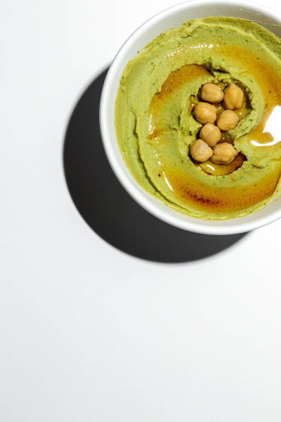 istock Homemade avocado and chickpea hummus 1245088086