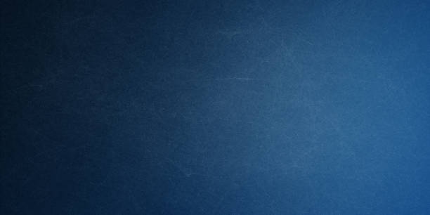istock Texture of old navy blue paper closeup 1245091915