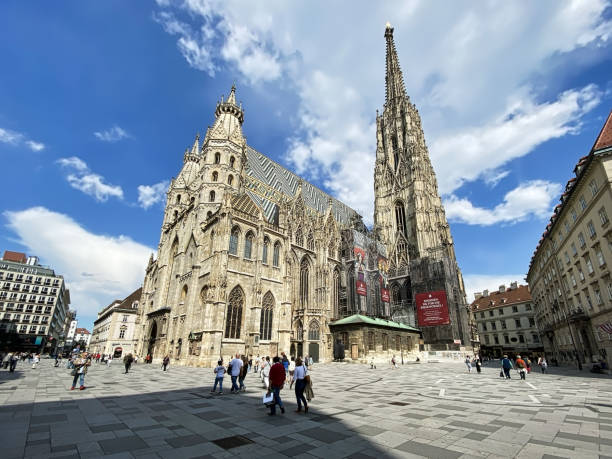 St. Stephen's Square With St. Stephens Cathedral Vienna, Austria - June 3, 2020: people walking on Stephansplatz in front of St. Stephens Cathedral. Historic place in central Vienna st. stephens cathedral vienna photos stock pictures, royalty-free photos & images