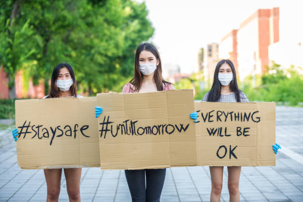 istock Friends meeting outdoors during pandemic flu 1245103685