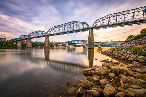 Chattanooga, Tennessee, USA river and bridge at dusk.