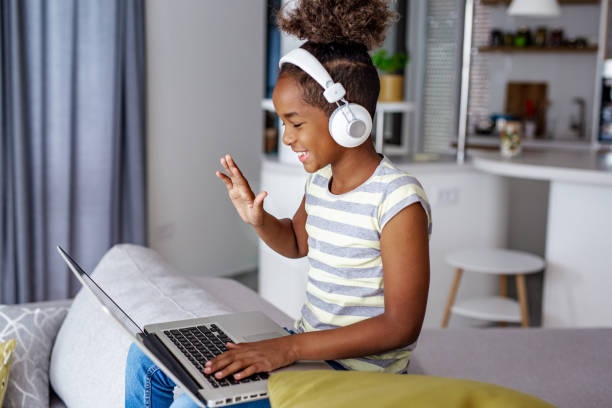 istock Young girl at home on a video call 1245122864