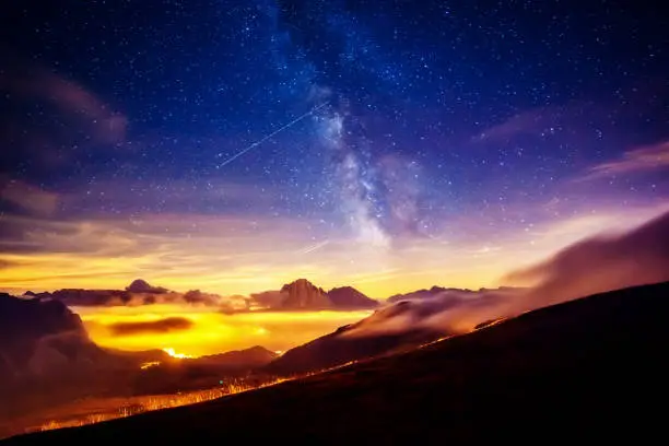 Photo of Sassolungo (Langkofel) and Sella group under starry light. Natural park Dolomites, valley Gardena, South Tyrol.