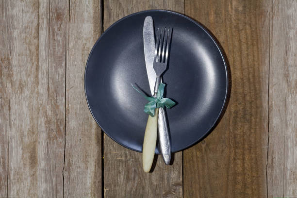 istock Cutlery on a wooden table 1245131024