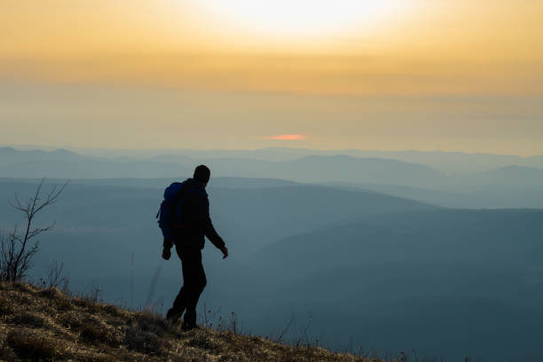 istock Man hiking on mountain 1245161980