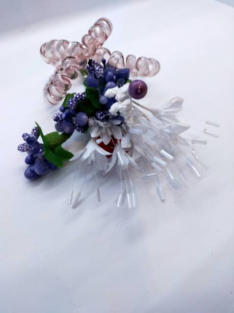 istock Bouquet with artificial flowers on a white background. 1245169635