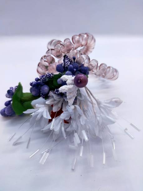 istock Bouquet with artificial flowers on a white background. 1245170768