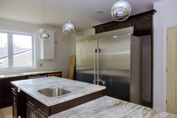 istock New white kitchen installed furniture cabinets and countertop 1245178890