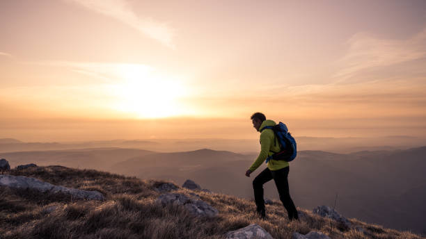 istock Man hiking on mountain 1245181873