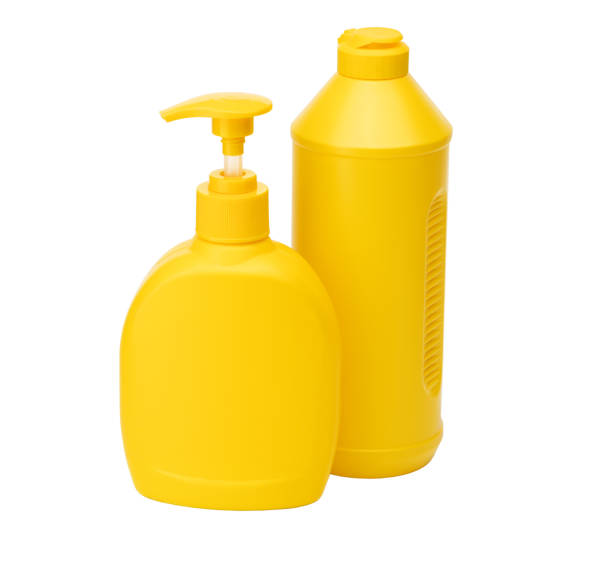 istock Two Yellow bottles with dishwashing liquid isolated on a white background 1245188944