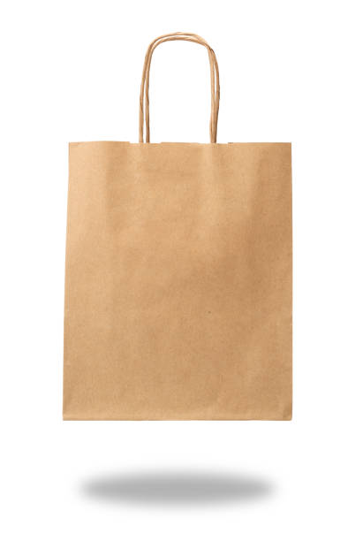 istock Hand holding a paper bag. Close up. Isolated on white background. 1245188979