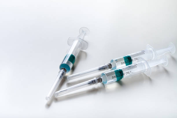 istock Several syringe on white table prepared for injection in hospital 1245191766