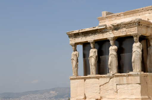 The famous Caryatids (dominating the Porch of Maidens) at the magnificent Erechtheion, Acropolis, Athens, Greece.