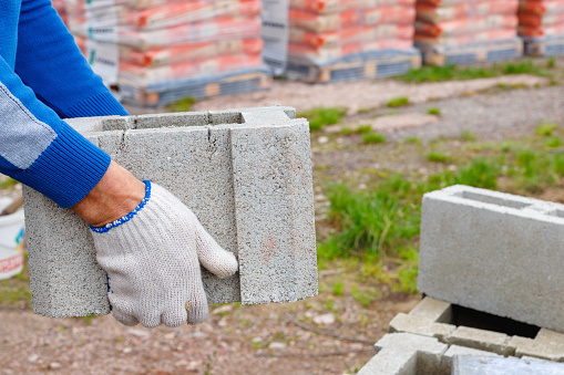 Slurry Blocks Worker Loads Cinder Blocks From Cement Slurry For Construction Stock ...