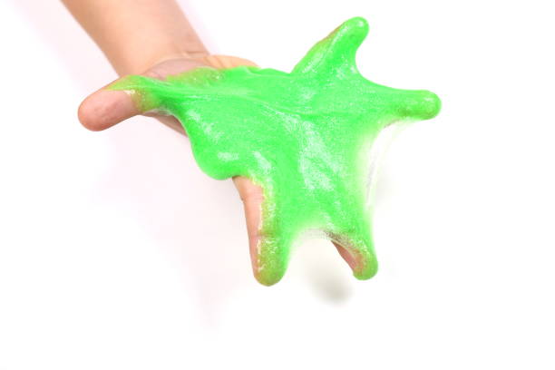 istock child's hands are playing with a slime 1245234827