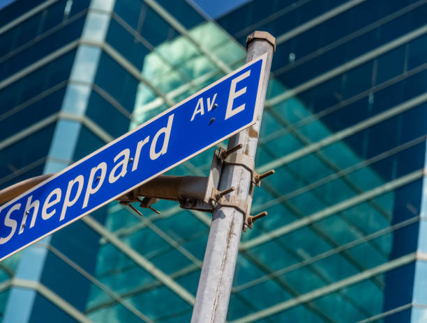 istock A road sign against a building. 1245238749