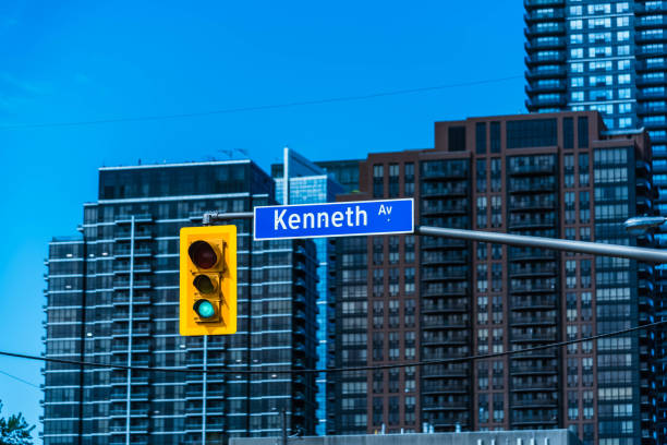 istock A road sign against sky and building. 1245238770