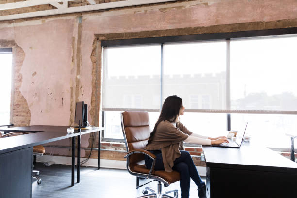 istock Confident female design professional works in office 1245241073