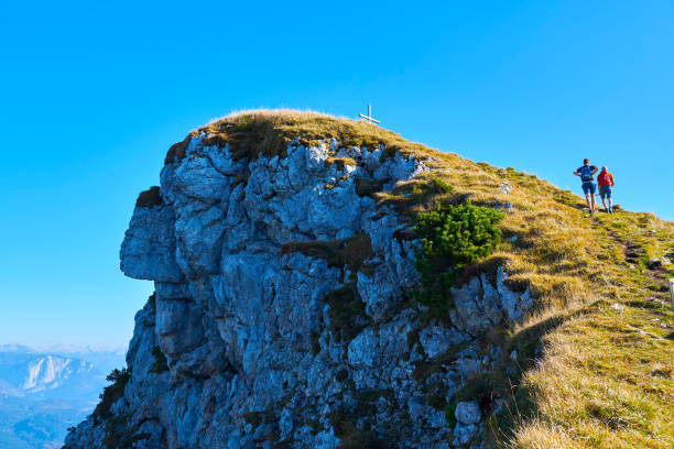 Two People hiking at mountains with backpack.