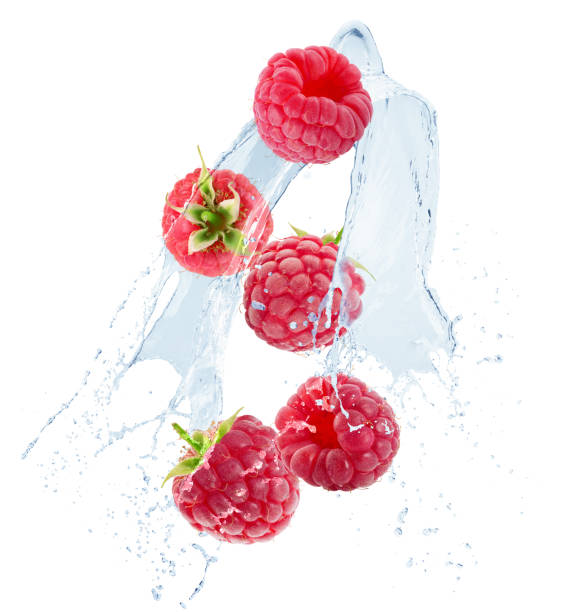 istock raspberries in water splash isolated on a white background 1245271074