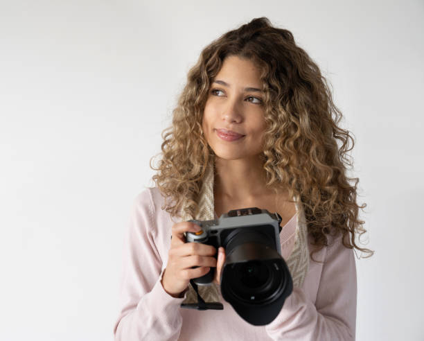 istock Thoughtful photographer holding the camera 1245271083