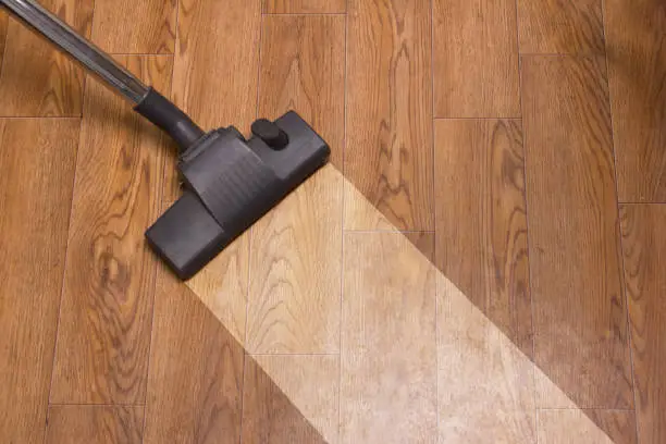 floor cleaning of linoleum with a vacuum cleaner