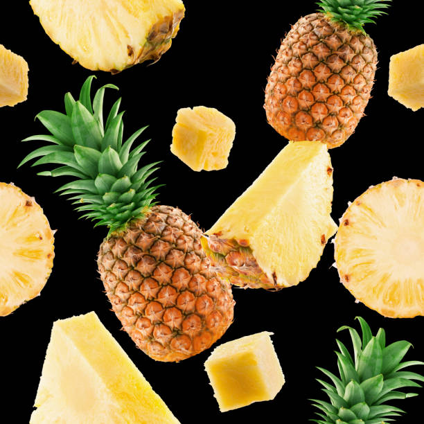istock seamless pattern with pineapple and pineapple slices on a black background 1245278046