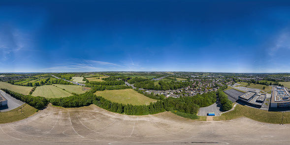 360 Degree panoramic sphere aerial photo of the UK village of Cleckheaton in Bradford West Yorkshire in the UK showing farmers fields along side the M63 Motorway in a bright sunny summers day