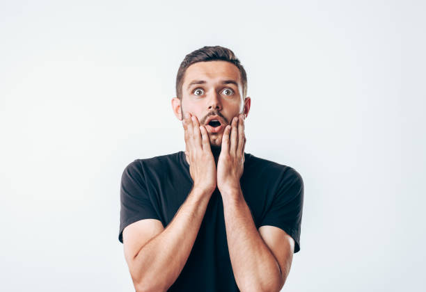 istock Portrait of young surprised man 1245284648