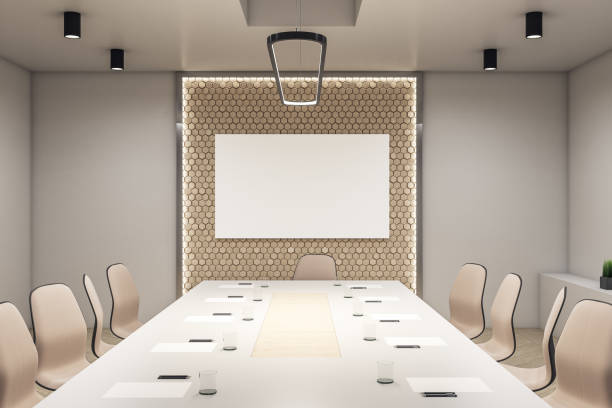 istock Modern meeting room interior with blank poster 1245290777