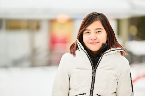 Photo of Beautiful girl outdoors on a winter day