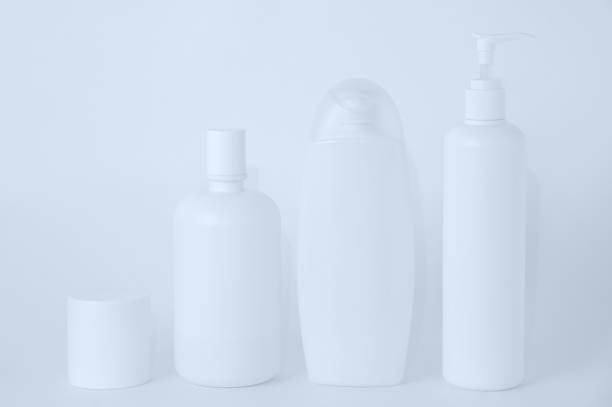 istock White plastic bottles with cosmetics on a white background. 1245323248