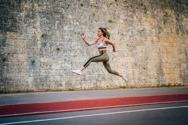 istock Woman athlete jumping during exercising 1245360176