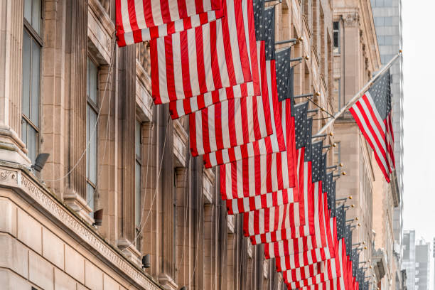 istock American flags against office building 1245370691