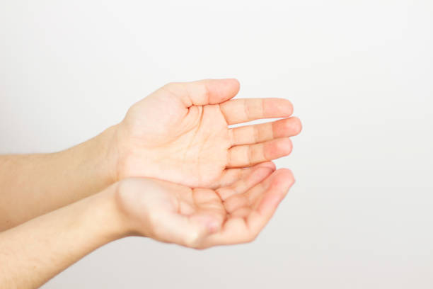 istock Open hand on white - Open palm gesture. isolated on white background 1245370705