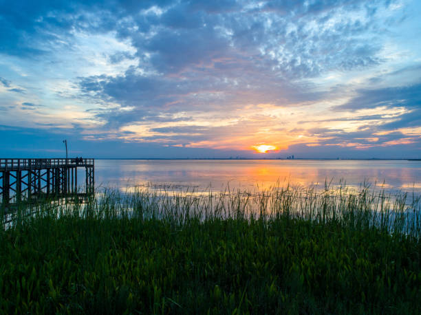 istock Beautiful summer sunset on Mobile Bay 1245375934